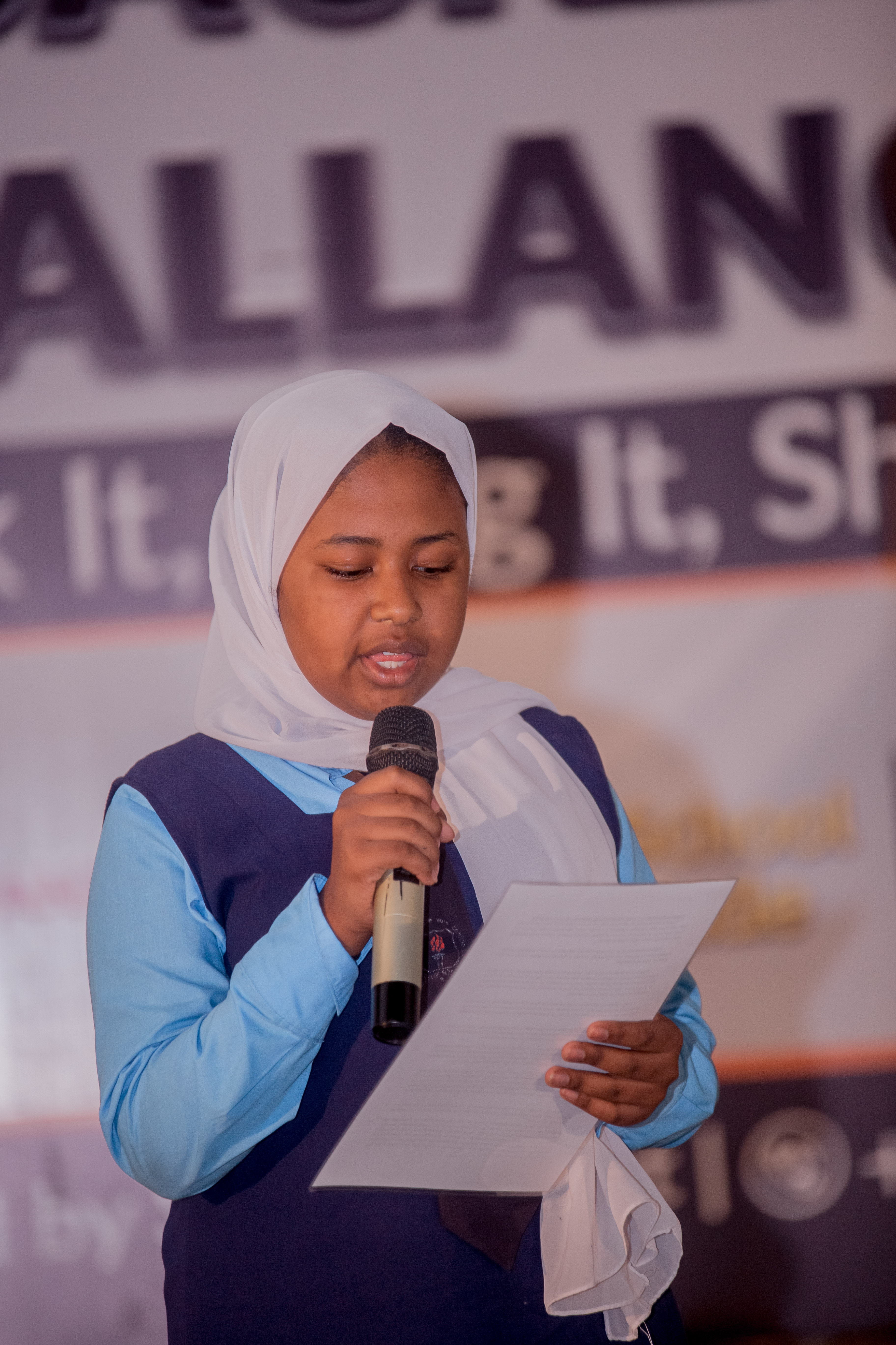 Youth sharing a story, representing the rise of a voice